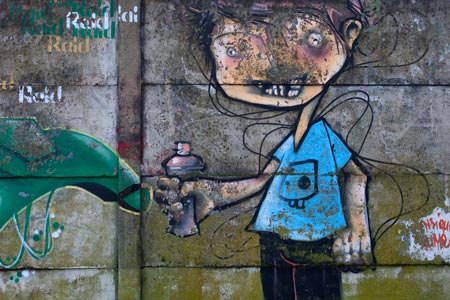 Garçon à la bombe à peinture - Graph’mur pris à Nantes par Norbert Pousseur ©