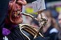 Trombonne visage mordant - carnaval 2010 Bâle - © Norbert Pousseur