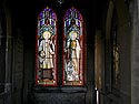 Double vitrail avec couple de saints - vitrail de cimetière - © Norbert Pousseur
