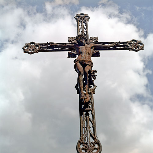 Croix en fer forgé rouillé avec Christ - © Norbert Pousseur