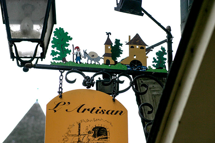 Enseigne au menier et son moulin - © photo Norbert Pousseur