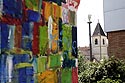 Eglise de Bagnolet devant panneau tagué - Graph’mur photographié par Norbert Pousseur ©