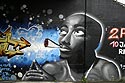 Garçon noir un joint à la bouche - signé Rocket, Graph’mur photographié par Norbert Pousseur ©