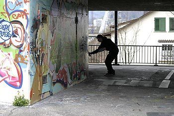 Graffeur en action - Graph’mur photographié par Norbert Pousseur ©