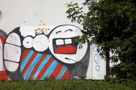 Mascotte riante - Graph’mur pris à Riga par Norbert Pousseur ©