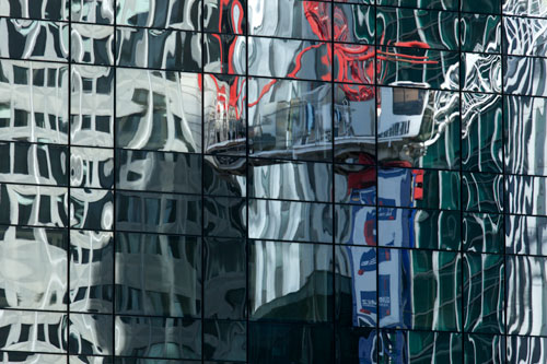 Crane and windows in reflections - © Norbert Pousseur