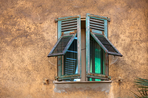 Half opened green shutters - © Norbert Pousseur