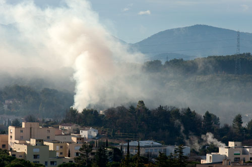 Fumada sobre la ciudad - © Norbert Pousseur