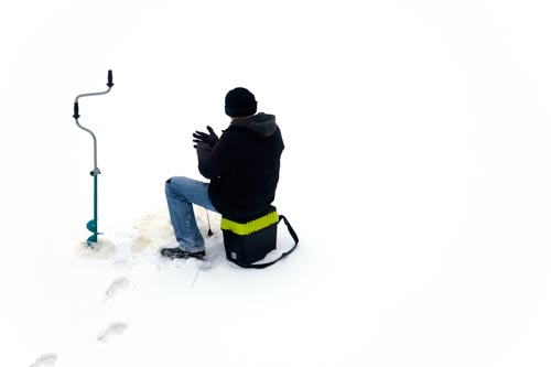 Fisherman sat on the ice - © Norbert Pousseur