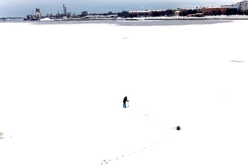 Pêcheur sur la Daugava - © Norbert Pousseur